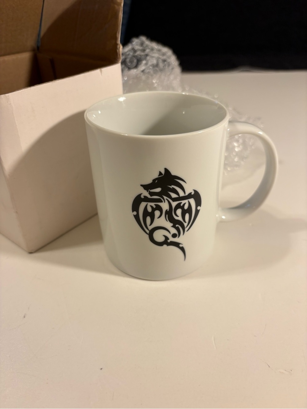White Ceramic Mug with Black Tribal Dragon Graphic